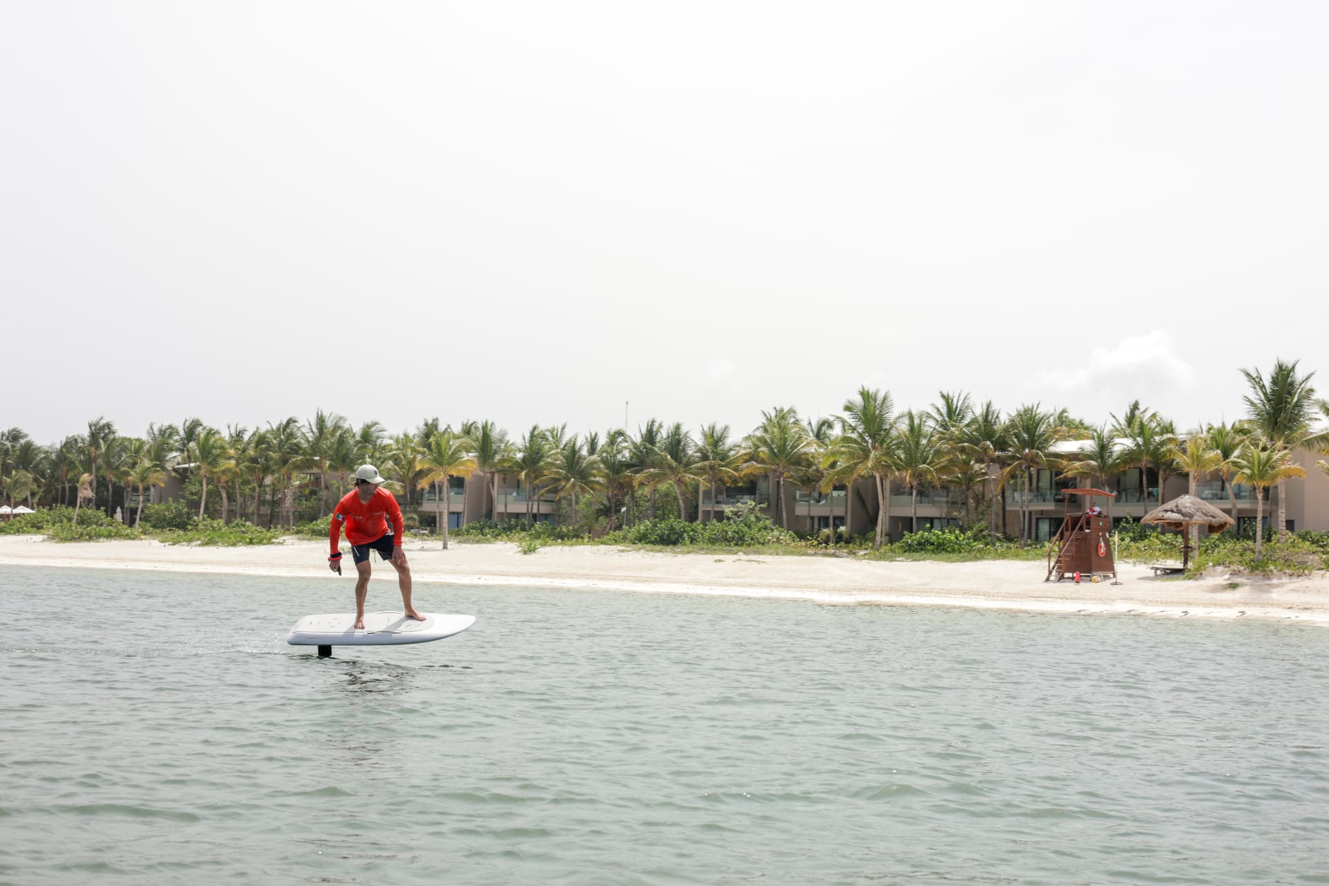 The Caribbean coastline at Mayakoba with a Fliteboard rider on the water